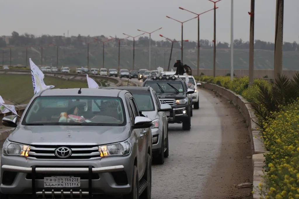 Al-Tabqa people celebrating victory achieved over Daesh