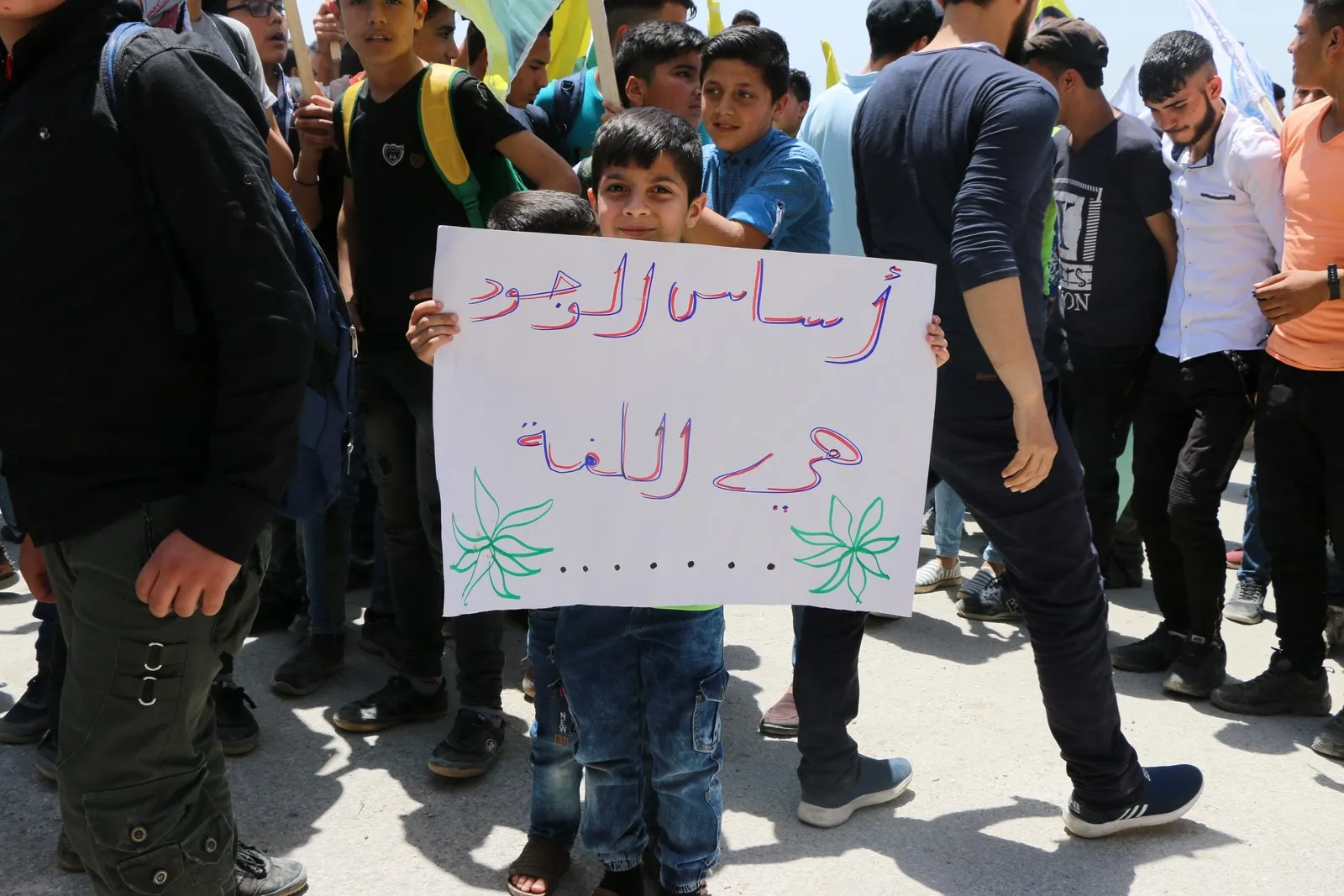 A student march congratulating Kurdish Language Day