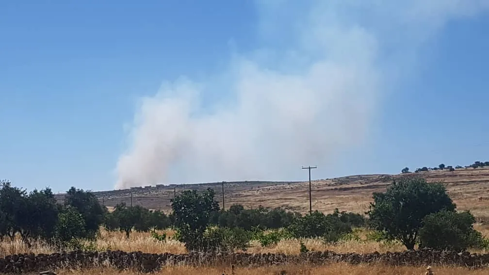 Turkish occupation set fire to fields, orchards of Afrin