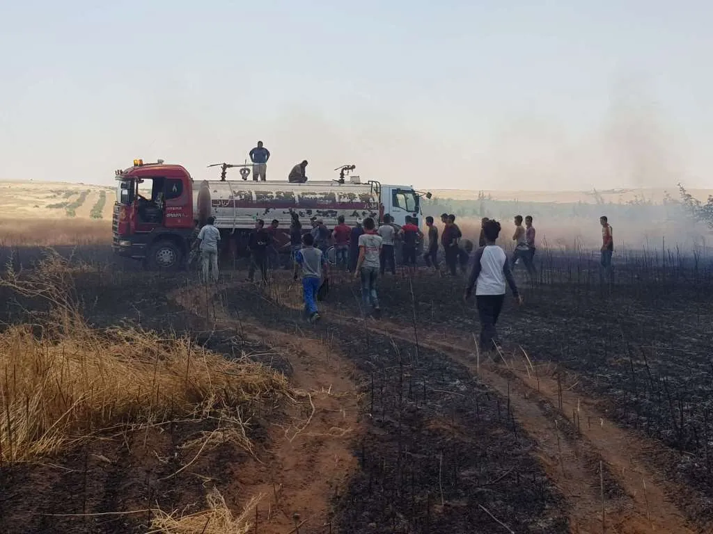 A fire consumes large tracts of land in Shiran district