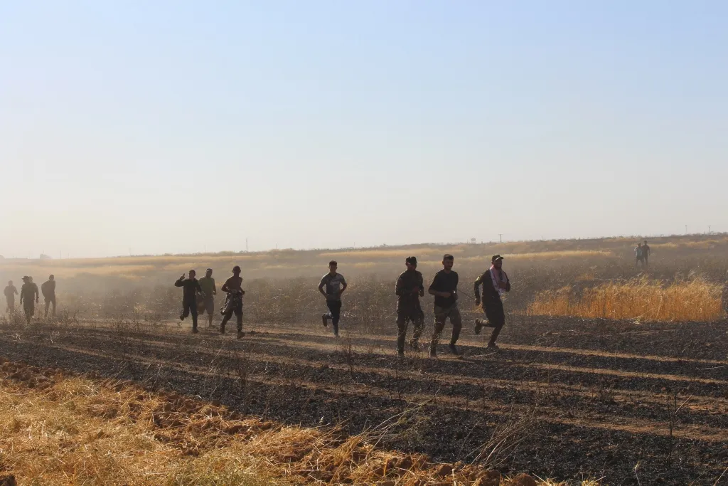 Fire extinguished after consuming 26 villages' fields in Tal Hamis, ad-Darbasiya