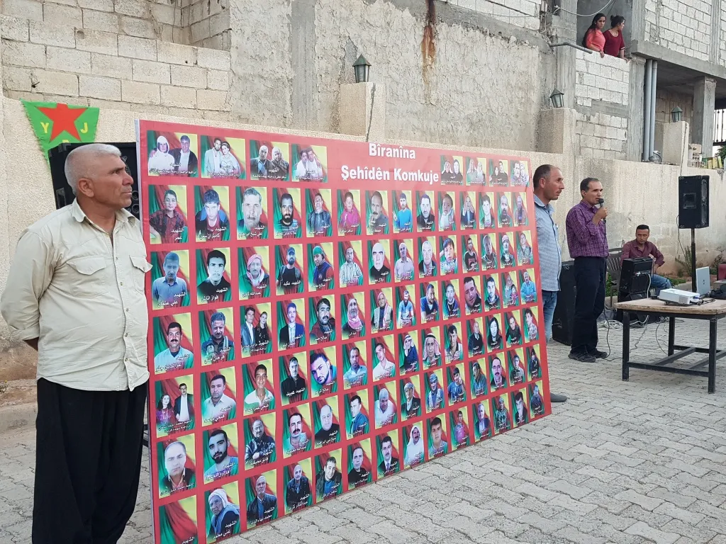 Kobani people light candles on 25th June martyrs' shrines