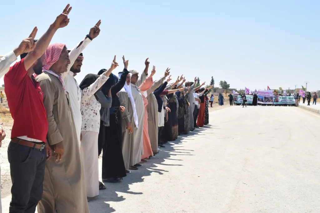 Northern Syria people gather in Girê Spi in rejection of Turkish threats