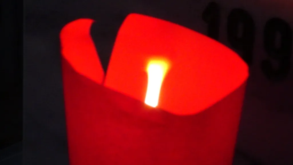 People of Kobani are lighting candles on shrines of martyrs of July