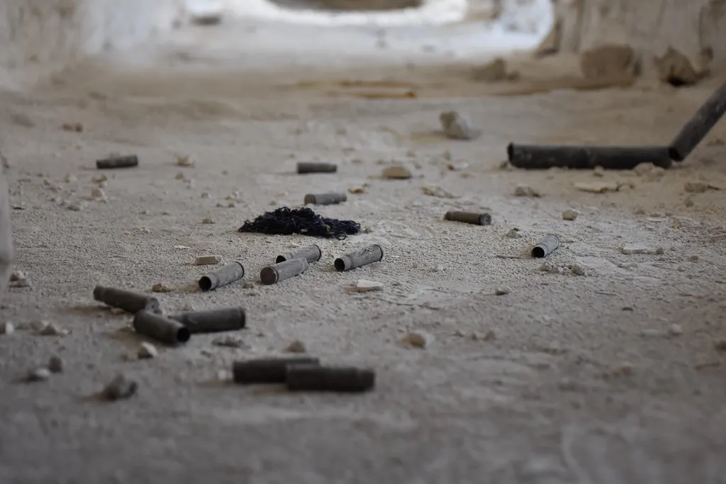 What did gangs do in corpses of its elements in al-Ashrafieh neighborhood?