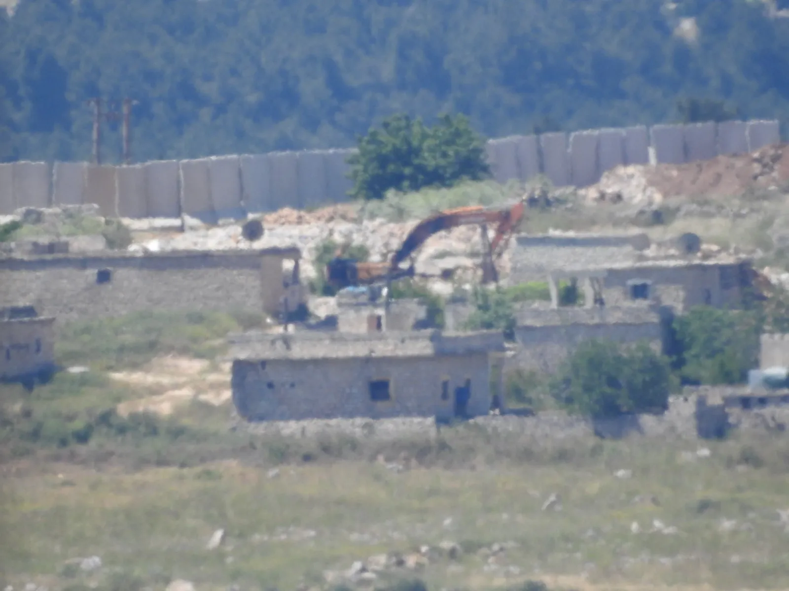 Turkish occupation uses other ways to build partition wallلا