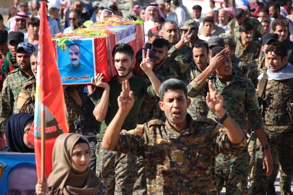 Manbij people bid farewell martyr Ali Haron's corpse