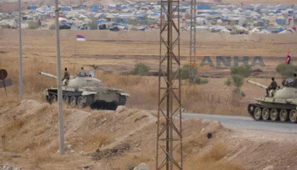 Russian forces carry out a patrol in Ain Issa