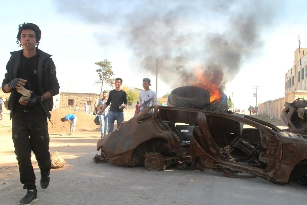 Joint patrol in Kobane shoot protesters; reports of casualties