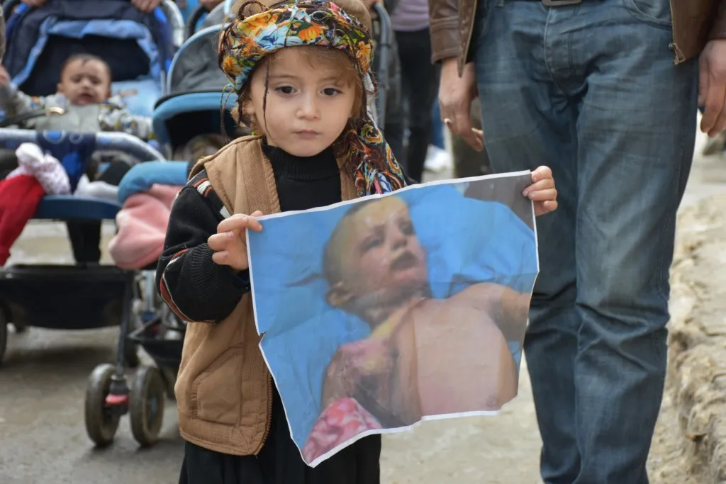 Demonstrators: Children killer cannot exterminate our presence