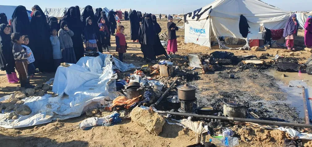 ISIS women tried to burn an Indonesian with her children for demanding return to her country