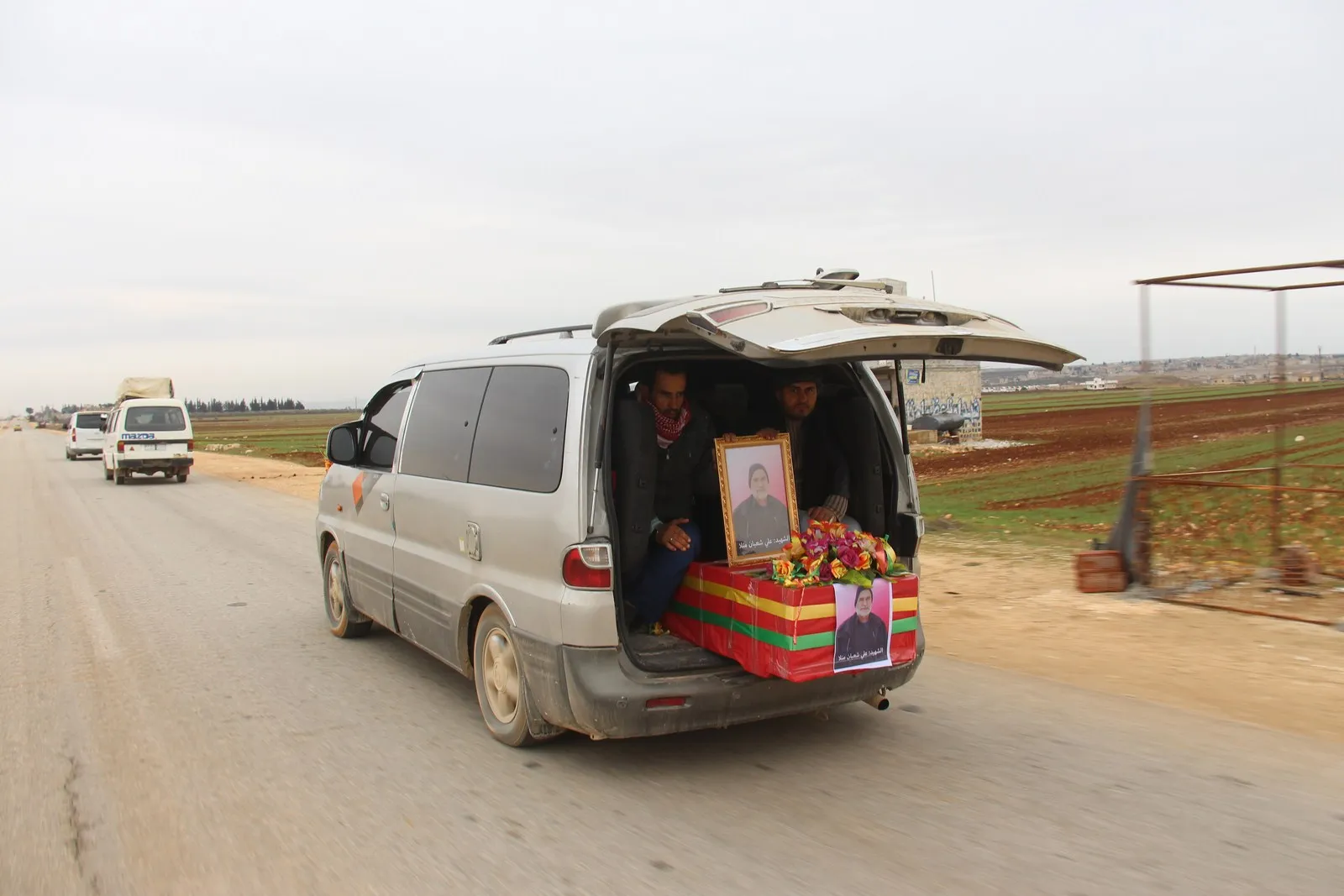 Thousands of displaced people mourn a civilian martyred while praying dawn in Turkish shelling