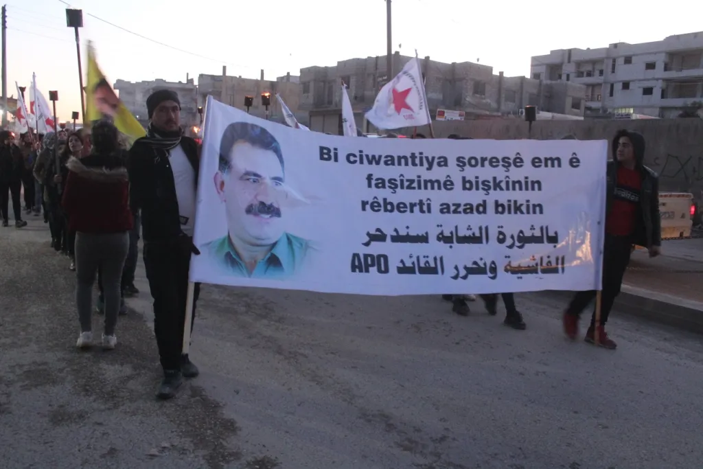 Youth denounced in night march international plot against Ocalan