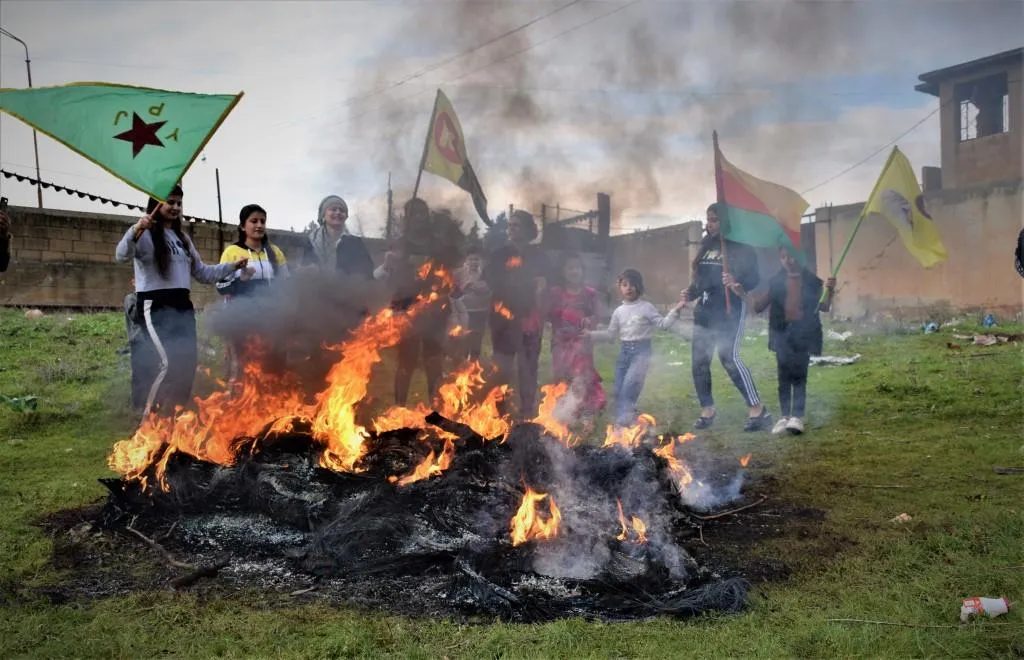 Qamishlo people lit Newroz torch within small gatherings
