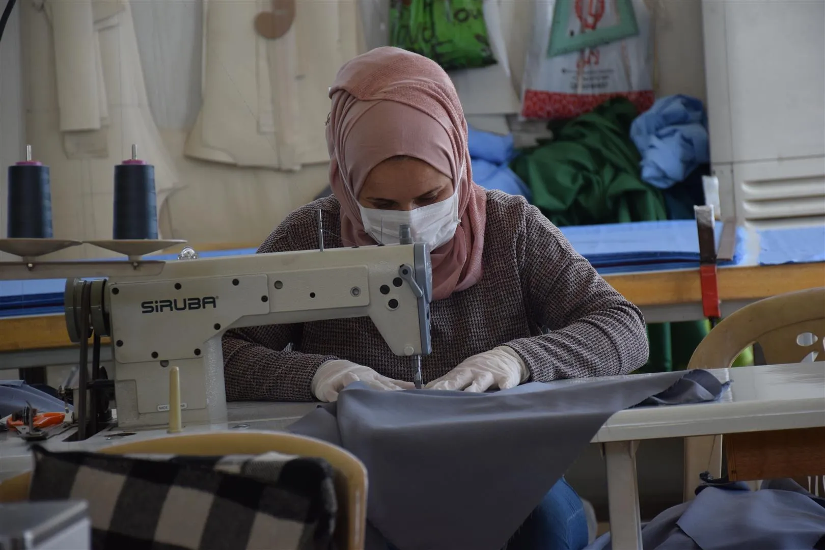 Lavin sewing workshop provides 500 medical scrubs daily for free