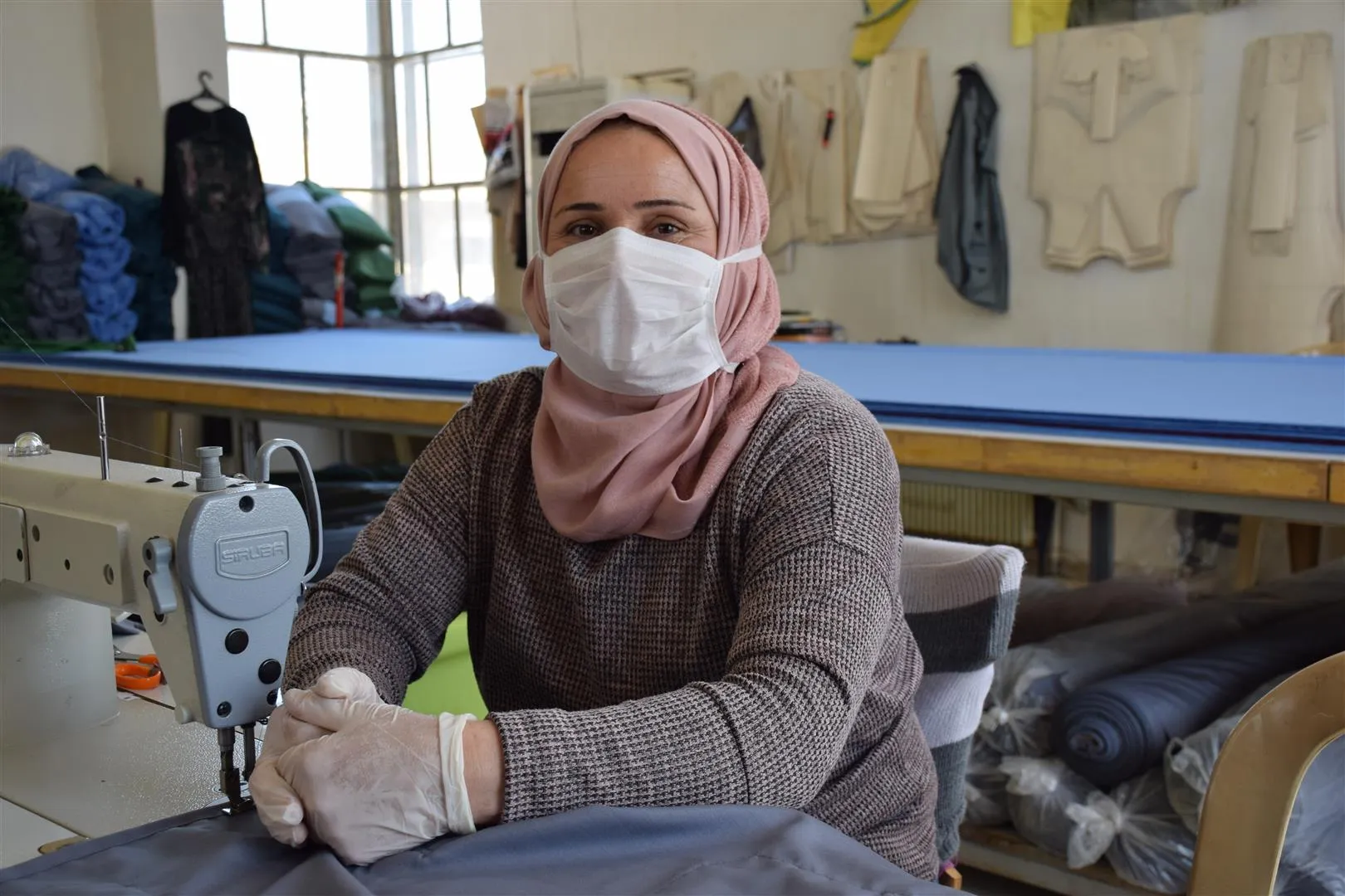 Lavin sewing workshop provides 500 medical scrubs daily for free