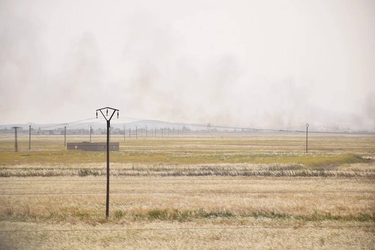 Mercenaries continue to burn crops, villagers fear fire will reach their lands