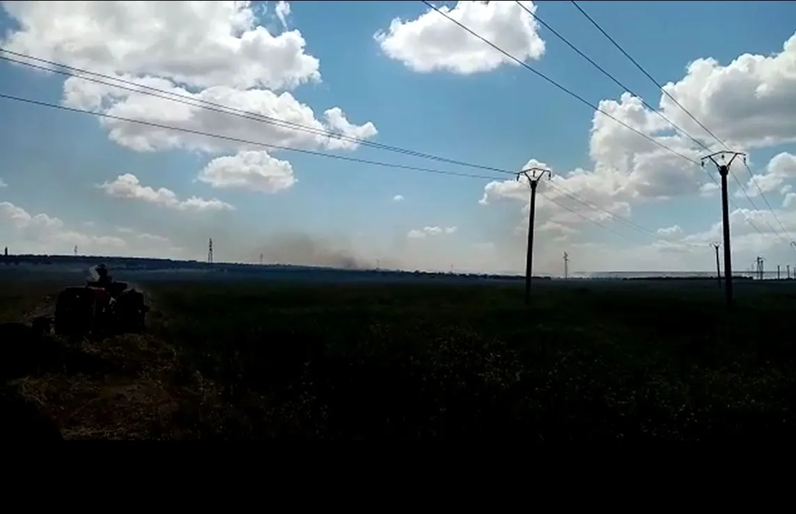 Turkish occupation burns crops between Basleh, Beneh villages in Sherawa district