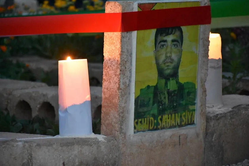 Martyrs' shrine lit with candles on Eid Al-Fitr