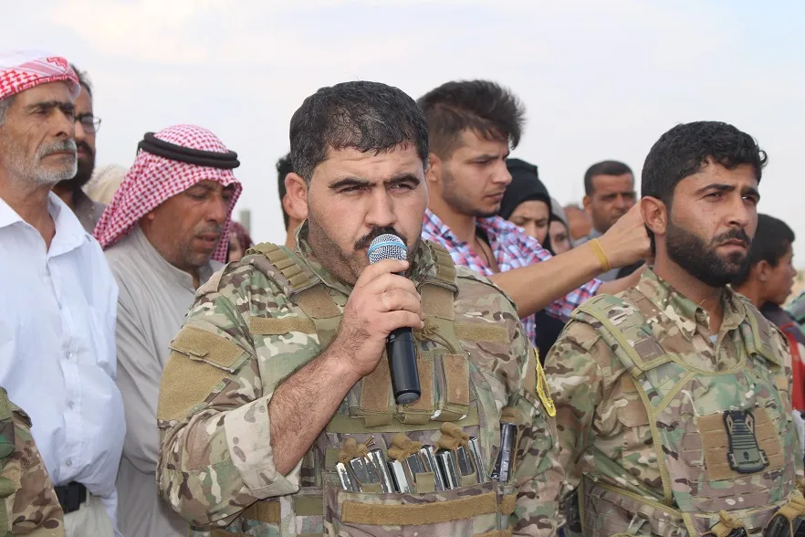 Al-Raqqa people bid farewell two martyrs