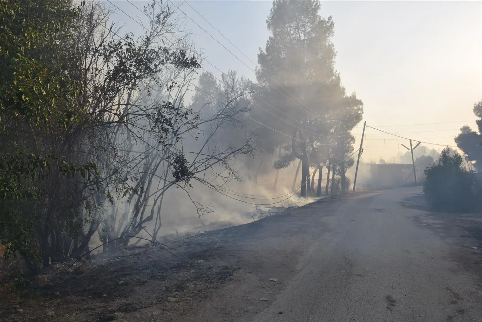 Turkish occupation's fire burns houses and suffocates civilians