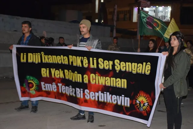 Youth salute resistance in prisons, denounce plot against Şengal during torchlight procession