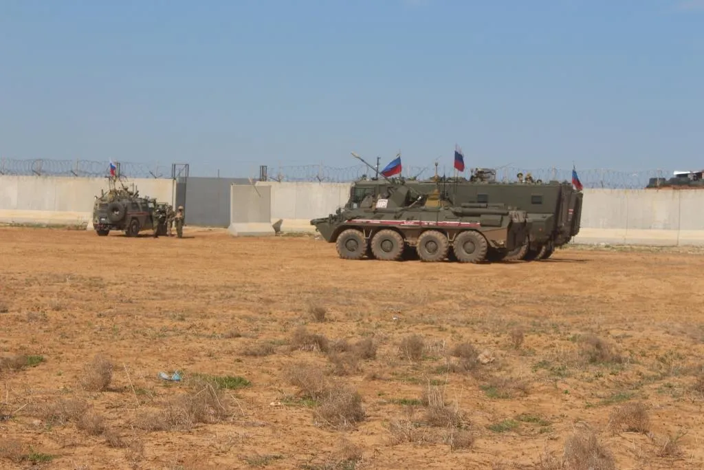 Russian police crash into a civilian car in Ad-Darbasiyah