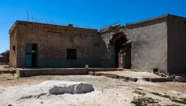 By photos ... Destruction caused by Turkish tank shells of village in Ain Issa