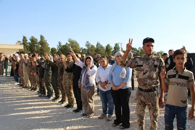 Martyr Faisal Al-Farij laid  to his final resting place in Minbij