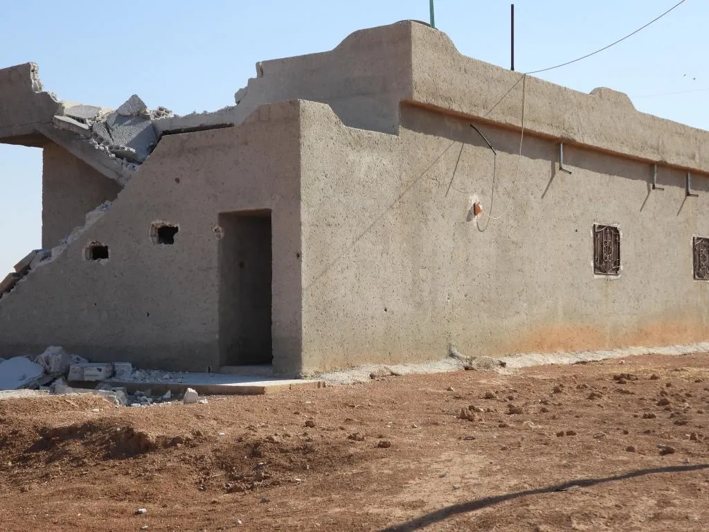 ANHA camera monitors damage left by Turkish occupation shelling on a village of Girê Spi
