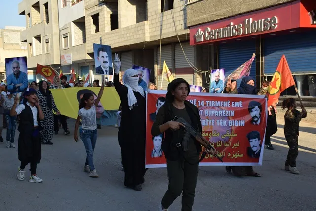 People of Amuda salute resistance of July 14 martyrs through a march
