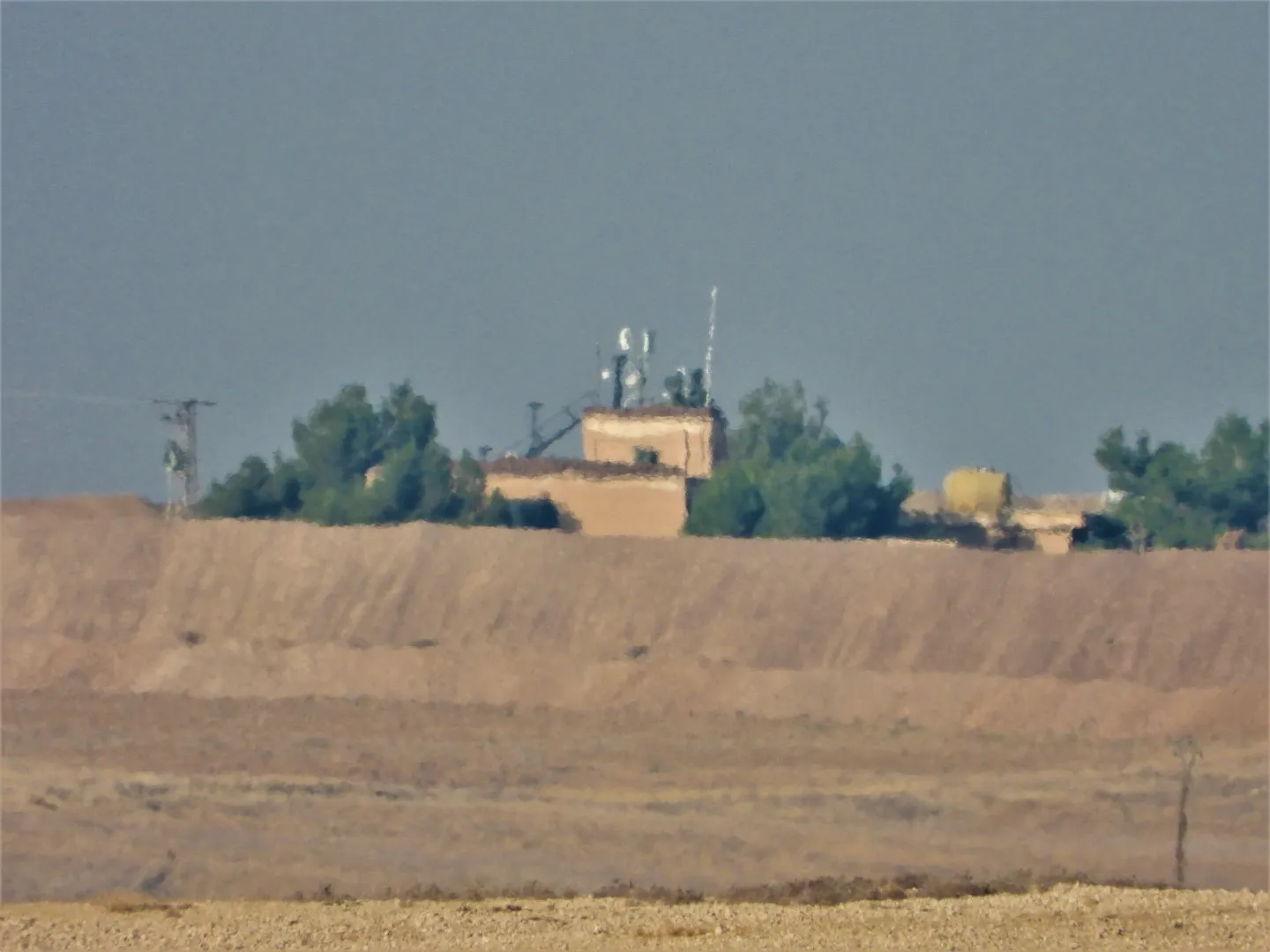 ANHA monitors Turkish occupation transforming civilian houses into military bases
