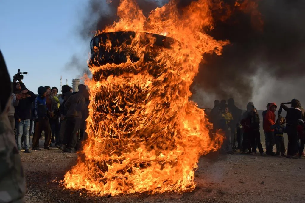 NES people lit Newroz Fire