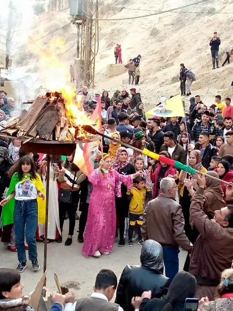 NES people lit Newroz Fire
