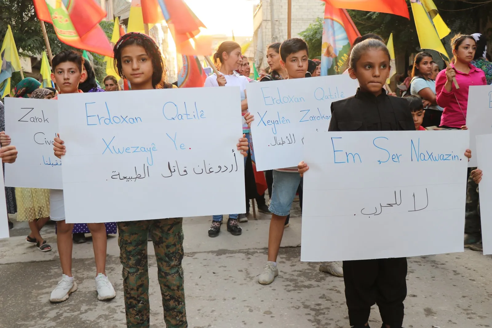 ​​​​​​​ large crowd in Aleppo condemns massacres of Turkish occupation