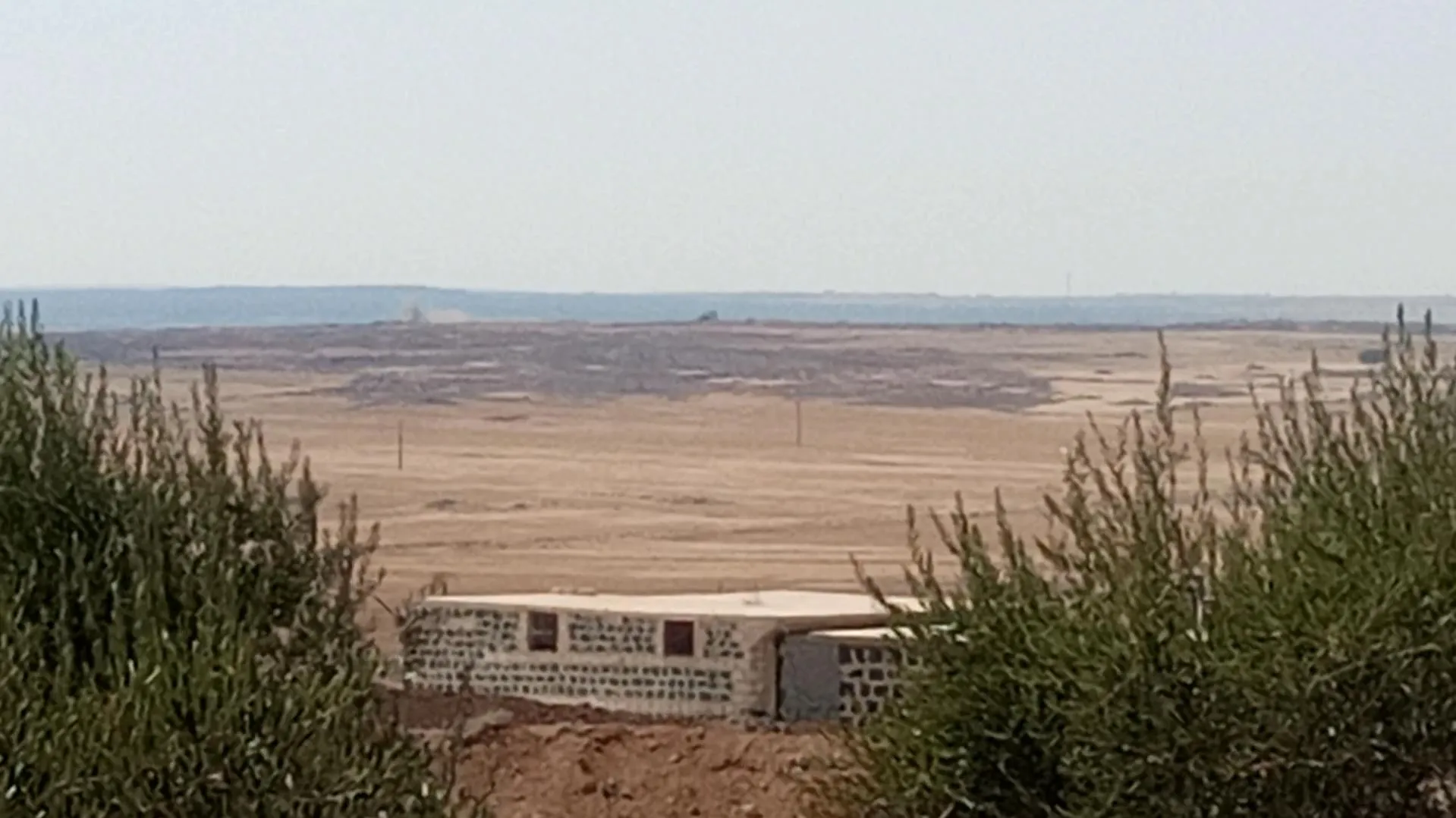 Turkish occupation army shelling the vicinity of the village of Bina in sherawa