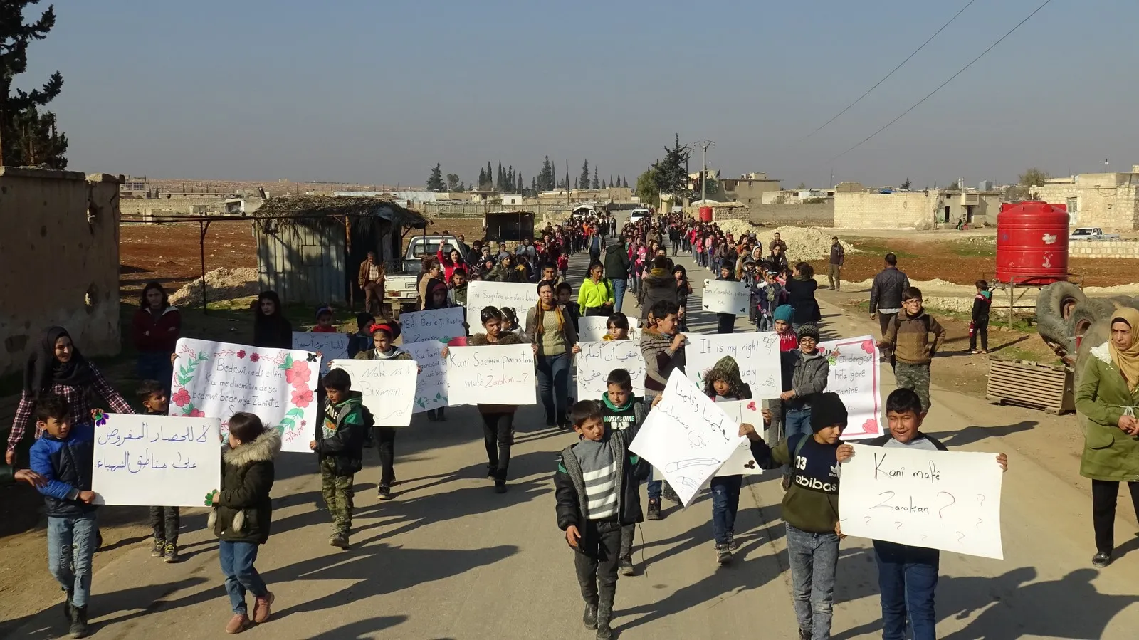 Student demonstrations in al-Shahba, calling for lifting government blockade