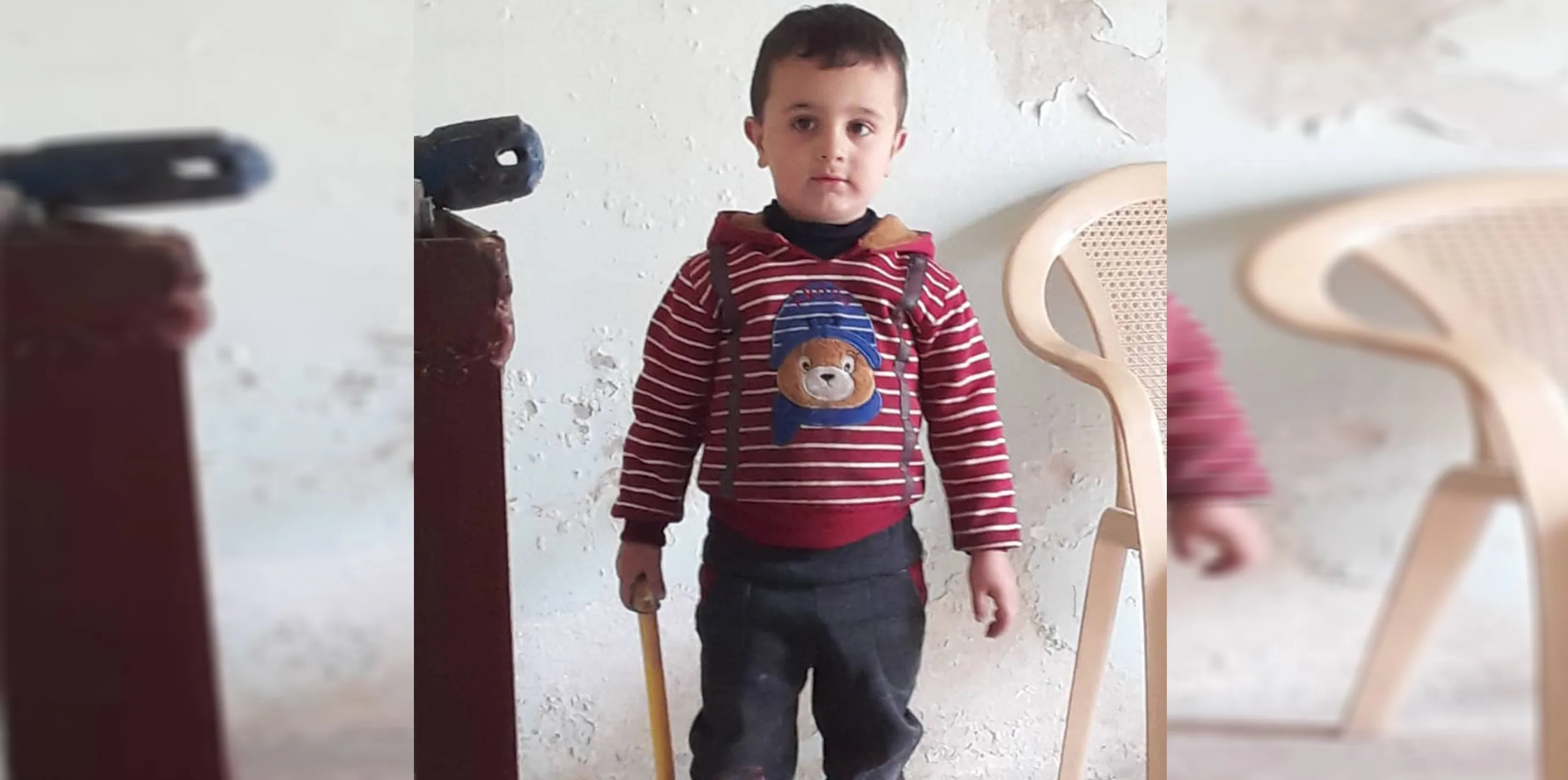 ​​​​​​​Sheikh Maqsoud records the death of a child under siege