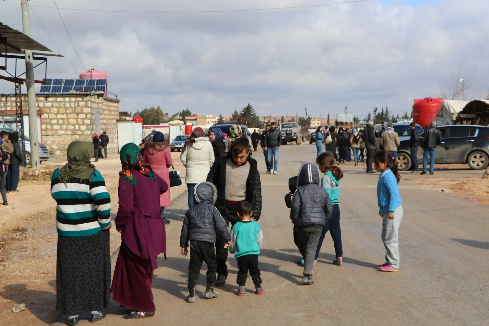 Thousand families arrive from the city of Aleppo to Shahba Canton and besieged Sherawa district