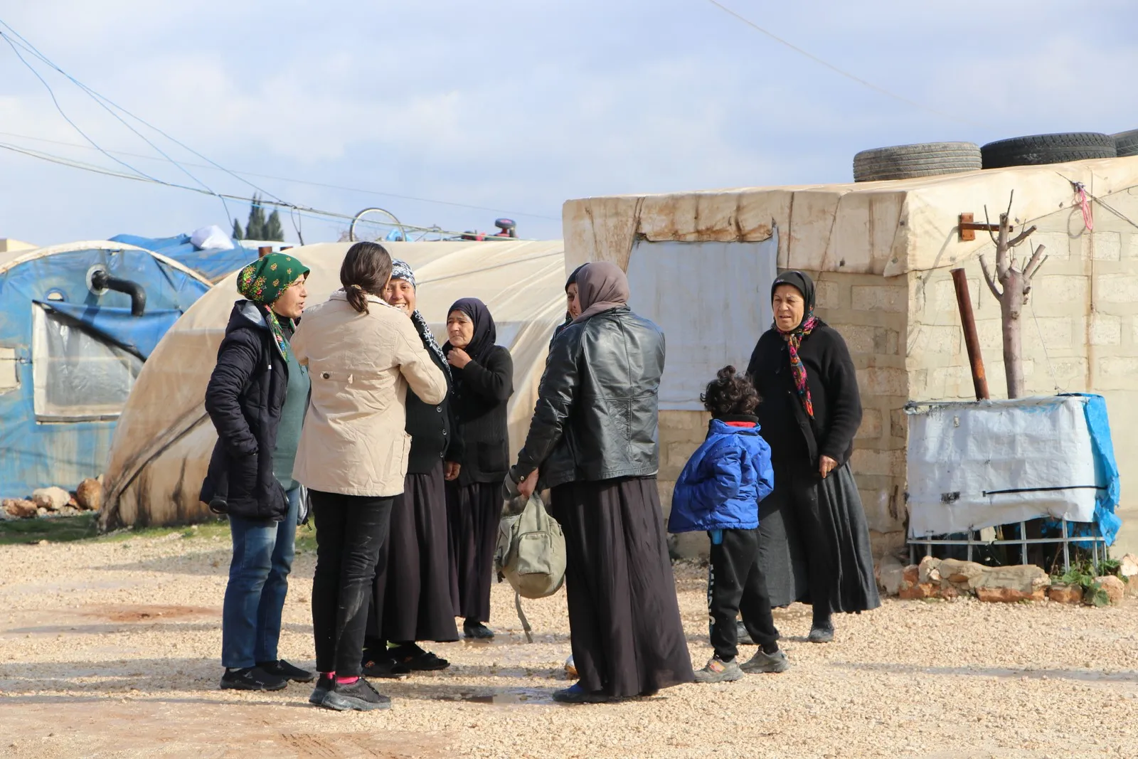 Thousand families arrive from the city of Aleppo to Shahba Canton and besieged Sherawa district