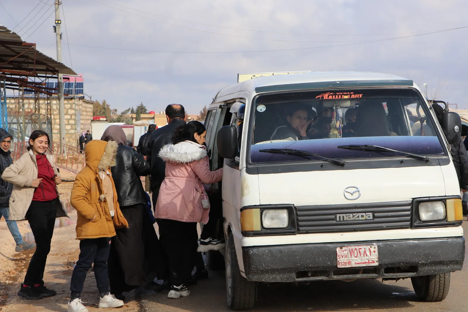 Thousand families arrive from the city of Aleppo to Shahba Canton and besieged Sherawa district