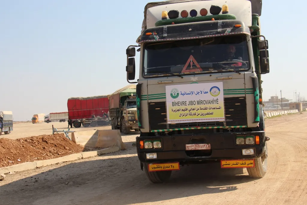 11 aid trucks cross from Al-Tayha crossing towards the areas affected by the earthquake