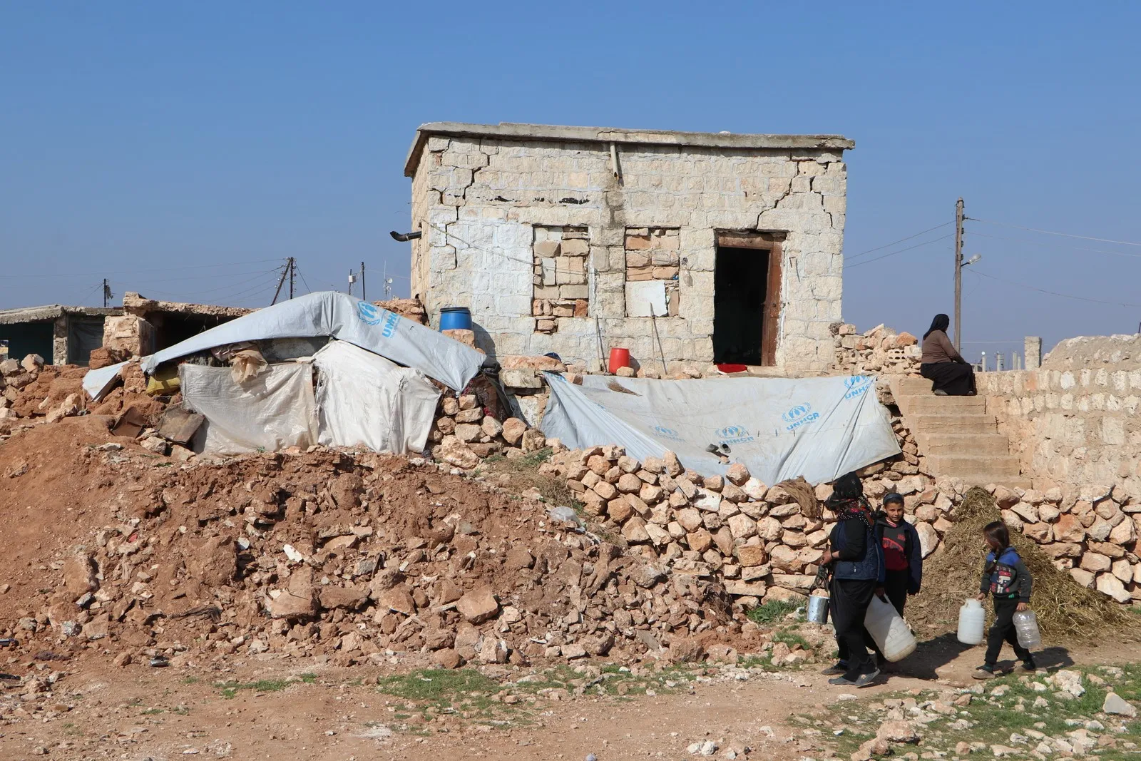 ​​​​​​​Distributing tents for those affected by the earthquake in al-Shahba- Sherawa areas