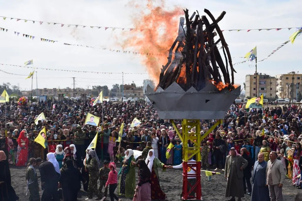 Amidst chants of Freedom for Leader Ocalan... Newroz fire lit in 11 Centers, Squares in Syria
