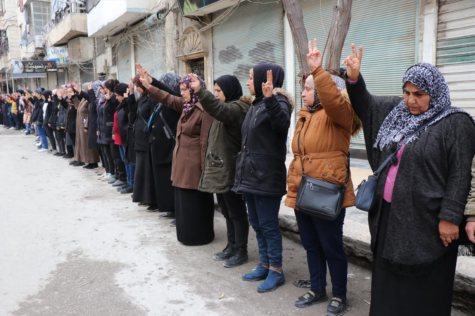 In honor of Halabça martyrs .. people of NE Syria stand 5 minutes of silence