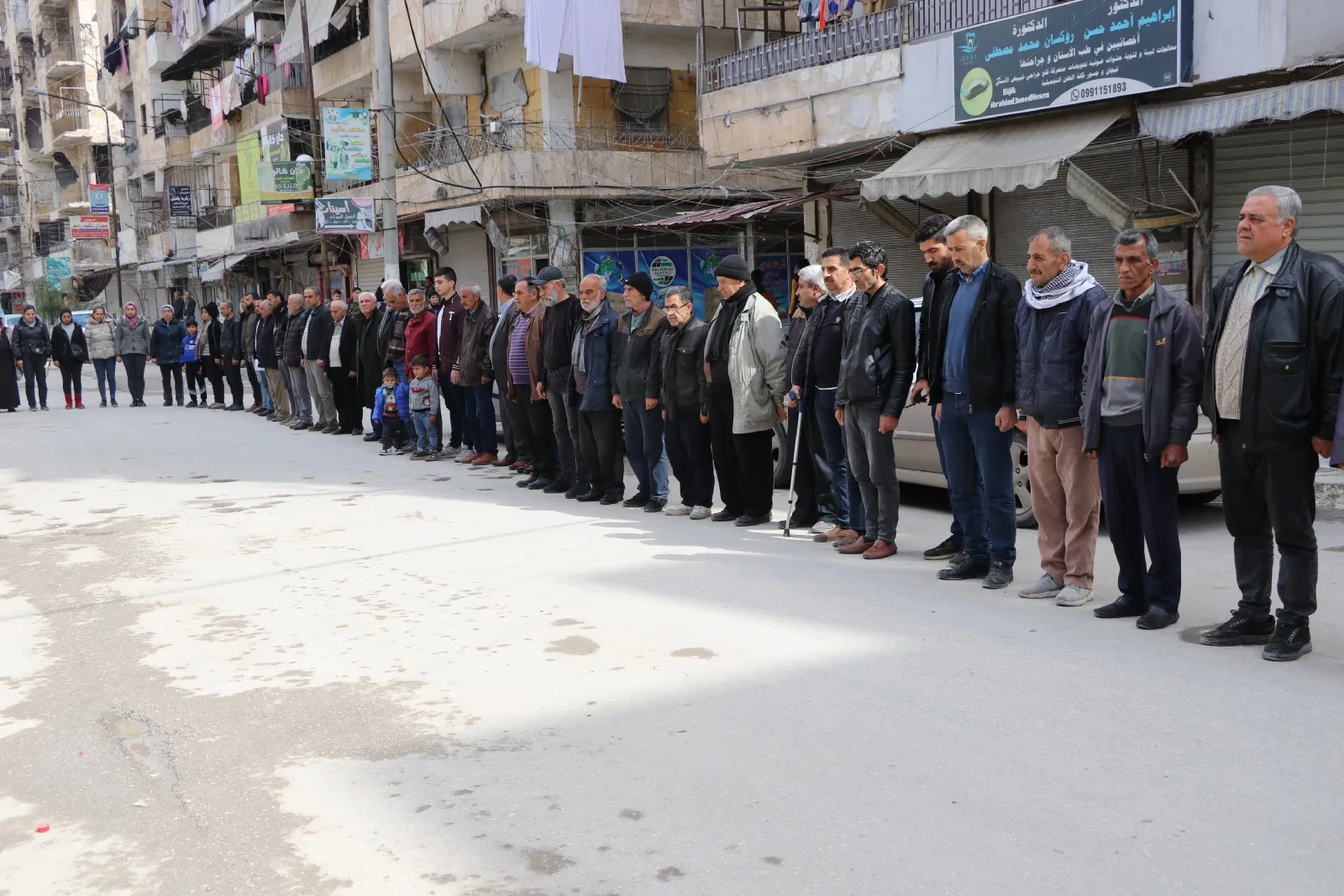 In honor of Halabça martyrs .. people of NE Syria stand 5 minutes of silence