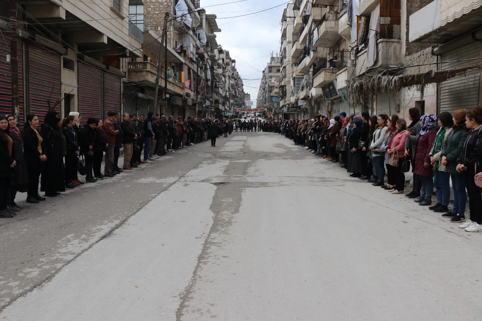 In honor of Halabça martyrs .. people of NE Syria stand 5 minutes of silence
