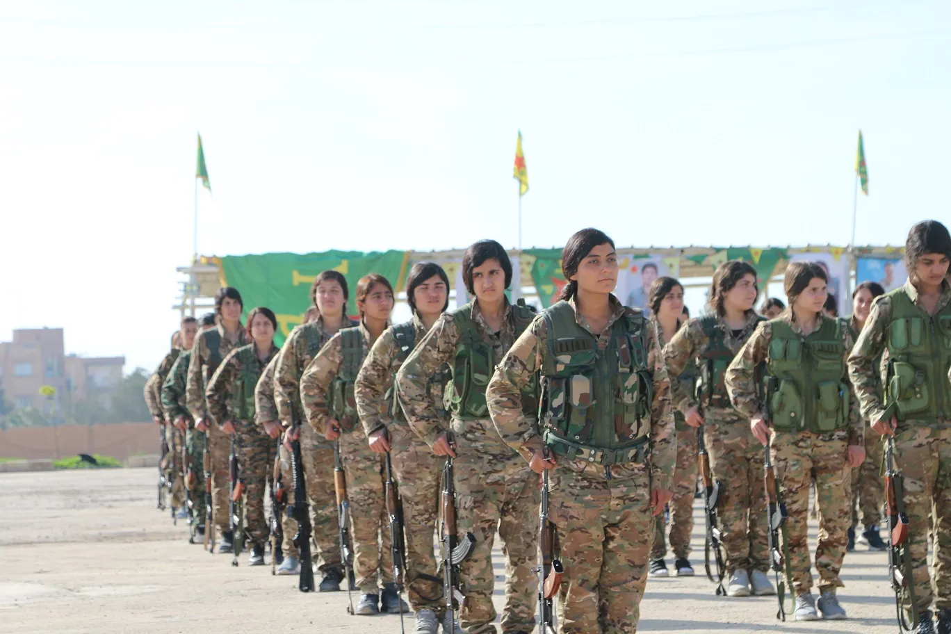 ​​​​​​​YPJ fighters celebrate April 4th