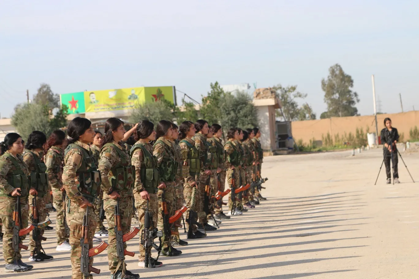 ​​​​​​​YPJ fighters celebrate April 4th