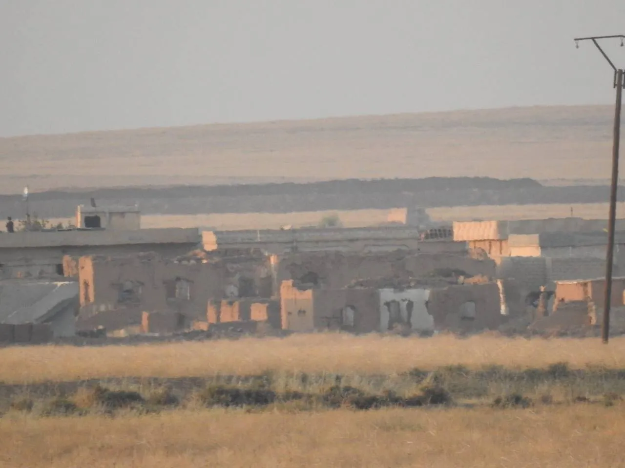 Turkey's mercenaries set fire to trees in Tal Tamr countryside
